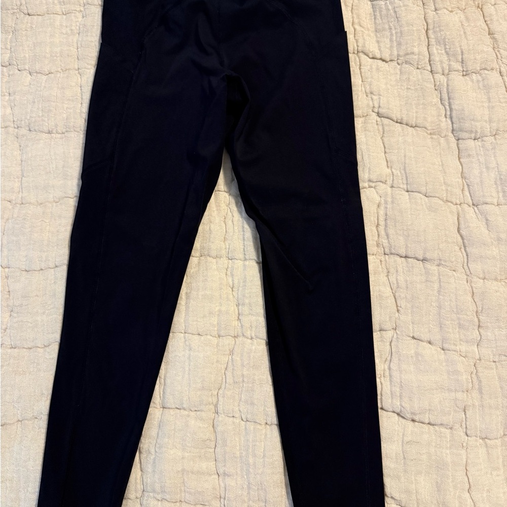 Vuori Black Leggings side pockets black size XS 24” inseam
